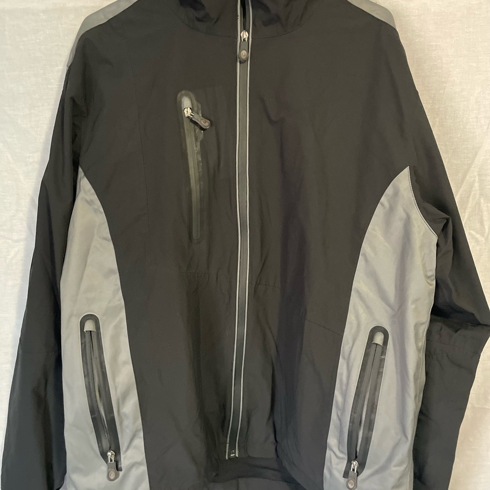 Lined Long Sleeve All-Weather Jacket- Typical golf rain jacket.